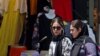 Women shop in Tehran on July 18, 2023, as the police relaunched patrols to catch women leaving their hair uncovered in public. Actress Afsaneh Bayegan received a suspended two-year prison sentence on July 19, 2023, for not wearing the compulsory hijab.