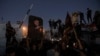 Protesters gather near the Swedish Embassy in Baghdad, Iraq, hours after the compound was stormed ahead of an expected Quran burning in Stockholm, July 20, 2023.