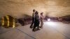 People visit the Safavid-era (1501-1736) Bagh Gandom Ab-Anbar (cistern) in Iran's central city of Yazd on July 3, 2023.