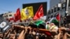 FILE - Mourners carry the body of a Palestinian killed in clashes in the occupied West Bank, July 5, 2023. Israeli forces killed a Palestinian on Thursday in the occupied West Bank city of Nablus, the Palestinian health ministry said. 