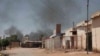 Asap hitam tampak mengepul di Khartoum, Sudan, Rabu, 3 Mei 2023 akibat konflik antara militer dan pasukan paramiliter di Sudan. (Foto: AP/Marwan Ali)