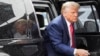 Former President Donald Trump arrives to board his plane at Ronald Reagan Washington National Airport, Arlington, Virginia, Aug. 3, 2023. Trump on Friday pleaded not guilty to three new charges related to his handling of U.S. classified documents.
