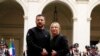 Italian Premier Giorgia Meloni, right, and Ukrainian President Volodymyr Zelenskyy shake hands before a meeting at Chigi Palace, Rome, May 13, 2023. Zelenskyy will meet the pope later.
