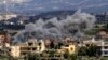 Asap mengepul di atas gedung-gedung menyusul serangan Israel di Desa Majdal Zoun di perbatasan selatan Lebanon, Jumat, 9 Maret 2024. (Foto: AFP)