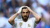 Real Madrid's French forward Karim Benzema reacts during the UEFA Champions league Group A football match between Real Madrid and Club Brugge at the Santiago Bernabeu stadium in Madrid on October 1, 2019.