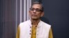 ফাইল ছবি- অভিজিৎ ব্যানার্জি ক্যামব্রিজে ম্যাসাচুসেটস ইনস্টিটিউট অফ টেকনোলজিতে এক সংবাদ সম্মেলনে যোগ দিয়েছেন। ১৪ অক্টোবর, ২০১৯।