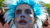 An Argentina soccer fan watches the team lose to Saudi Arabia at a World Cup Group C soccer match, played on a large screen in the Palermo neighborhood of Buenos, Aires, Argentina, Nov. 22, 2022.