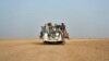 FILE - Nigeriens and third-country migrants head towards Libya from Agadez, Niger, June 4, 2018. 