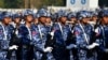 Anggota militer Myanmar berbaris di lapangan parade untuk merayakan Hari Kemerdekaan negara itu di Naypyidaw pada 4 Januari 2023. (Foto: AFP)