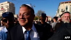 FILE - Itamar Ben Gvir, Israel's new Minister of National Security and leader of the far-right Otzma Yehudit (Jewish Power) party, arrives to visit Jerusalem's Mahane Yehuda market on Dec. 30, 2022. 