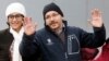FILE - U.S. journalist Jason Rezaian gestures next to his wife, Yeganeh Salehi, in front of Landstuhl Regional Medical Center in Landstuhl, Germany, Jan. 20, 2016. Rezaian was released from an Iranian prison Jan. 17, 2016.