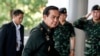 FILE - Thai Army chief General Prayuth Chan-Ocha arrives before a meeting to discuss the 2015 national budget at the Army Club in Bangkok, June 13, 2014. 