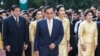 FILE - Thailand's Prime Minister Prayuth Chan-ocha (C), his wife Naraporn Chan-ocha (2nd R) and his cabinet pray for the health of Thailand's revered King Bhumibol Adulyadej, at the Siriraj hospital in Bangkok.