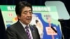 Japanese Prime Minister Shinzo Abe speaks during a press conference at his official residence in Tokyo, July 1, 2014. 