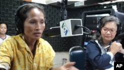 Sorn Touch, far right, one of the evicted residents, and Mu Sochua, a lawmaker for the Sam Rainsy Party, on “Hello VOA" Thursday. 