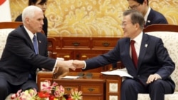 VOA Asia - Pence talks tough ahead of Olympics