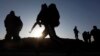 Afghan security forces arrive at the site of truck blast in Kabul, Afghanistan, Nov. 18, 2014.