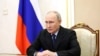 Presiden Rusia Vladimir Putin memimpin pertemuan dengan anggota Dewan Keamanan melalui tautan video di Moskow, Rusia, 1 Maret 2024. (Foto: Sputnik/Sergei Ilyin via REUTERS)