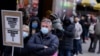 People wait in line at a COVID testing site in NYC on Dec. 13, 2021. (AP Photo/Seth Wenig, File)