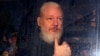 WikiLeaks founder Julian Assange arrives at the Westminster Magistrates Court, after he was arrested in London, Britain, April 11, 2019. 