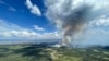 This July 27, 2023, aerial image from the British Columbia Wildfire Service, shows smoke from the the Ross Moore wildfire south of Kamloops, British Columbia, Canada.