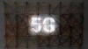 A 5G sign is seen inside the Xiaomi booth at the Mobile World Congress in Barcelona, Spain, Feb. 26, 2019.