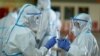 Ma'aikatan lafiya da ke kula da masu cutar coronavirus