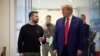 This handout photograph released by the Ukrainian presidential press service on September 27, 2024 shows Ukrainian President Volodymyr Zelensky (L) and Republican presidential nominee former US President Donald Trump meeting on September 27, 2024 in New York. 