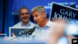 Libertarian presidential candidate Gary Johnson speaks during a rally late Monday, Oct. 3, 2016, in Parker, Colorado.