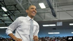 President Barack Obama arrives to speak at Florida Atlantic University in Boca Raton, Florida, April 10, 2012.