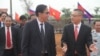 លោក ប៉ាន សូរស័ក្តិ រដ្ឋមន្ត្រីក្រសួងពាណិជ្ជកម្ម និង លោក វ៉ូ ហ្គុងមិញ (Vu Quang Minh) ឯកអគ្គរដ្ឋទូតនៃសាធារណរដ្ឋសង្គមនិយមវៀតណាម ប្រចាំនៅកម្ពុជា ចូលរួមពិធីសម្ពោធបើកការដ្ឋានសាងសង់ «ផ្សារដា» ដែលមានទីតាំងស្ថិតនៅក្នុងស្រុកមេមត់ ជាប់ព្រំដែនខេត្តត្បូងឃ្មុំ​ និងខេត្តតៃនិញ កាលពីថ្ងៃទី១៦ ខែមករា ឆ្នាំ២០១៨។ (រូបថតដកស្រង់ពីហ្វេសប៊ុកក្រសួងពាណិជ្ជកម្ម)