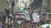 Demonstrators gather during a protest against Syria's President Bashar al-Assad after Friday prayers in Yabroud near Damascus March 2, 2012.