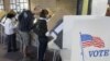 People vote early at the Salt Lake County Government Building in Salt Lake City, October 30, 2012.