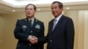Chinese Defense Minister Wei Fenghe (L) shakes hands with Cambodia's Prime Minister Hun Sen before a meeting in Phnom Penh, Cambodia, June 18, 2018. REUTERS