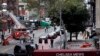 Emergency personnel work at the scene of Saturday's explosion on West 23rd Street in Manhattan's Chelsea neighborhood in New York, Sept. 19, 2016. 