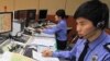 South Korean officials of the Incheon Maritime Police Agency monitor a situation room while on high alert in preparation for North Korea's planned launch of a Unha-3 rocket, in Incheon, South Korea, April 12, 2012.
