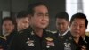 FILE - Thailand's Army commander Gen. Prayuth Chan-ocha, left, arrives at the Royal Thai Army Club in Bangkok, Thailand. 