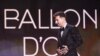 Paris Saint-Germain's Argentine forward Lionel Messi arrives to deliver a speech after being awarded the Ballon d'Or award during the 2021 Ballon d'Or France Football award ceremony at the Theatre du Chatelet in Paris on November 29, 2021. 