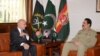 Afghan President Ashraf Ghani, left, meets with Pakistani General Raheel Sharif at army headquarters in Rawalpindi, Pakistan, Nov. 14, 2014. (Photo courtesy of Pakistani army)