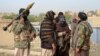 FILE - A group of Taliban fighters are seen in Ghazni province, Afghanistan, April 18, 2015.