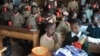 FILE - Pupils at the Stara primary school in Nairobi's Kibera slum eat a meal provided by the World Food Program (WFP), May 26, 2009, as part of a school feeding program. 