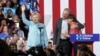 Sen. Tim Kaine, D-Va., hugs his wife Anne Holton during a with Democratic presidential candidate Hillary Clinton at Florida International University Panther Arena in Miami, Saturday, July 23, 2016.