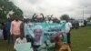 Wasu magoya bayan shugaban Najeriya Muhammadu Buhari a birnin Abuja