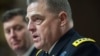 Army Undersecretary Patrick Murphy listens at left as Army Chief of Staff Gen. Mark Milley testifies on Capitol Hill in Washington at a Senate hearing to examine the implementation of the decision to open all ground combat units to women, Feb. 2, 2016.