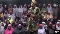 FILE - Boko Haram on Aug. 14, 2016 released a video of the girls allegedly kidnapped from Chibok in April 2014, showing some who are still alive and claiming others died in airstrikes.