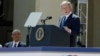 Former U.S. President George W. Bush addresses the dedication of the George W. Bush Presidential Center as U.S. President Barack Obama (L) listens during the ceremony on the campus of Southern Methodist University in Dallas, Texas, April 25, 2013.