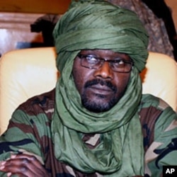 A 2009 file photo of Sudanese rebel Justice and Equality Movement (JEM) leader Khalil Ibrahim during a Darfur peace meeting in Doha, Qatar. He is currently living in Libya's capital, Tripoli.