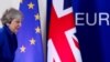 British Prime Minister Theresa May leaves after holding a news conference following an extraordinary European Union leaders summit to discuss Brexit, in Brussels, Belgium, April 11, 2019. 