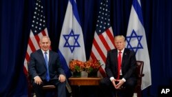 Fira Ministan Isra'ila, Benjamin Netanyahu (daga hagu) shugaban Amurka, Donald Trump (daga dama)