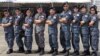 A group of Thai military personnel pose for a photograph after conducting a civilian evacuation drill. (Steve Herman/VOA News)